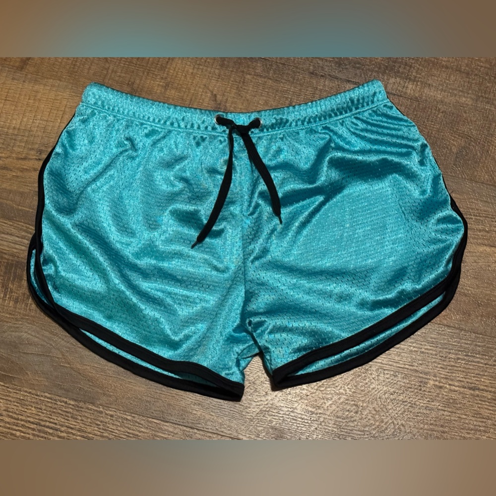 Vibrant Teal Athletic Shorts with Black Accents